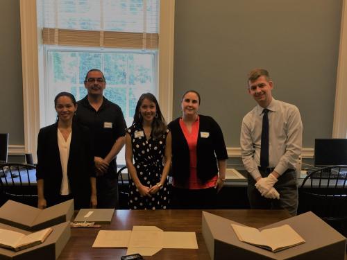 Viewing collections at the American Philosophical Society Library at the Digital Knowledge Sharing (DKS) Workshop. From left: Tiffany Hale, an American Philosophical Society fellow, Daniel Moya, social media outreach from the Museum of Indian Arts and Culture with the new web-based Indigenous Digital Archive, Holly Guise, a History PhD candidate at Yale and DKS fellow, Megan Lukaniec, a Linguistics PhD candidate at the University of California, Santa Barbara and DKS fellow, and Brian Carpenter Curator of Na